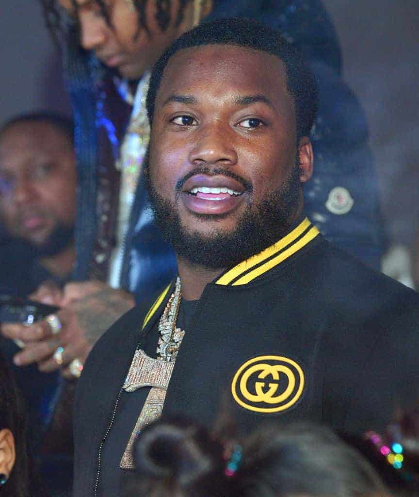 Meek Mill wearing Black and Yellow jacket