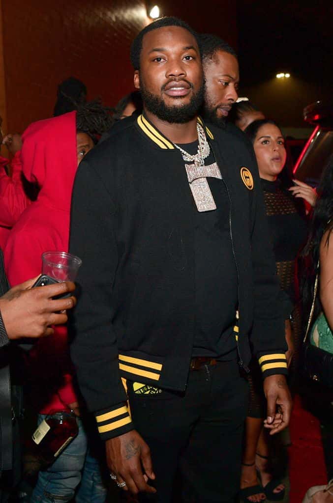 Meek Mill wearing Black and Yellow