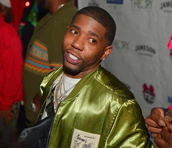 Rapper YFN Lucci attends Think its a Game Records Annual Ugly Christmas Sweater party at 433 Bishop on December 18