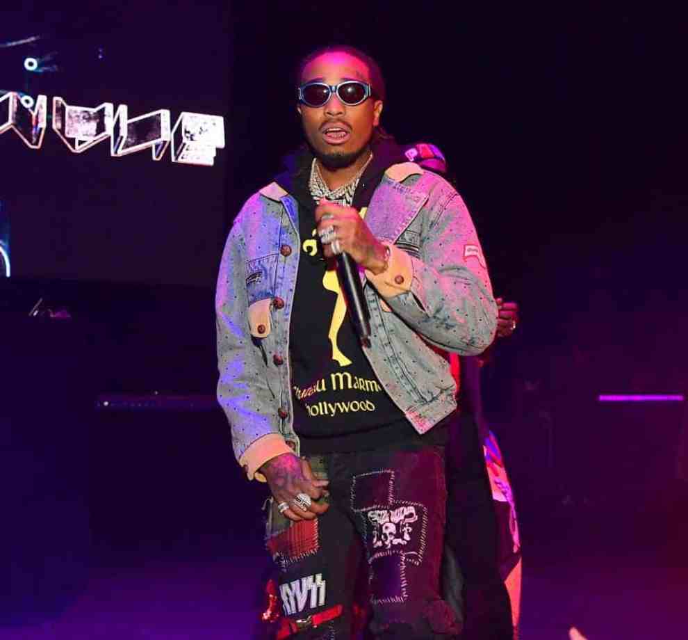 Quavo wearing multiple colors