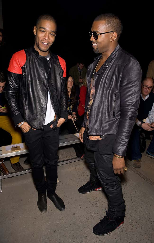 Kid Cudi and Kanye West wearing black and red