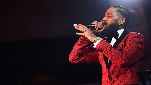 Nipsey Hussle performs onstage at the Warner Music Pre-Grammy Party at the NoMad Hotel on February 7