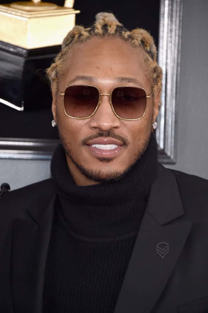 Future wearing black and sunglasses