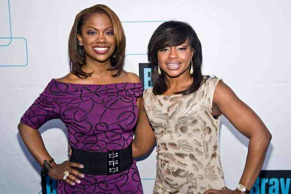 Kandi Burruss and Phaedra Parks standing next to each other