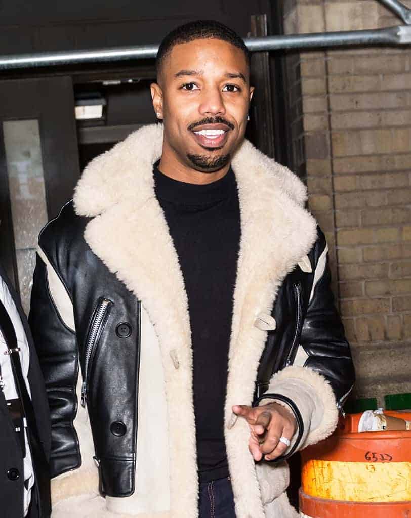 Michael B. Jordan wearing a black and white coat