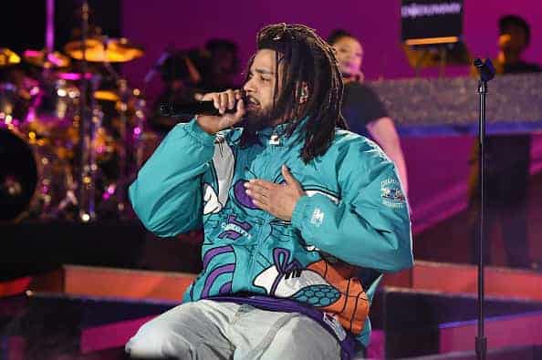 J. Cole performs at halftime during the 68th NBA All-Star Game at Spectrum Center on February 17