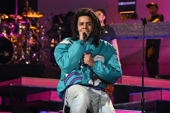 J. Cole on stage.
