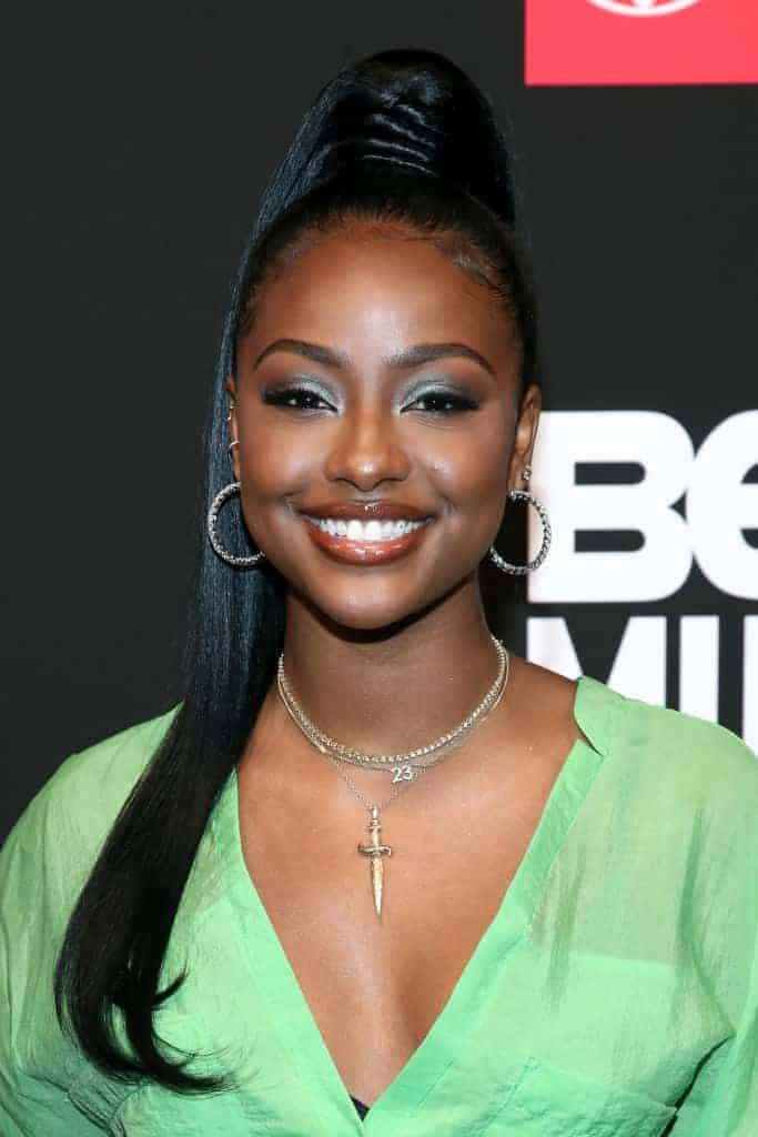 Justine Skye wearing Green