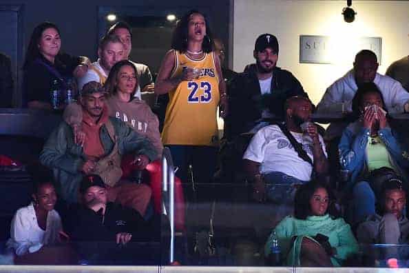 Rihanna attends a basketball game between the Los Angeles Lakers and the Houston Rockets at Staples Center on February 21
