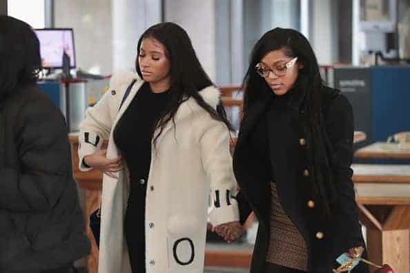 Joycelyn Savage (L) and Azriel Clary arrive for a bond hearing for R&B singer R. Kelly at the Leighton Criminal Court Building