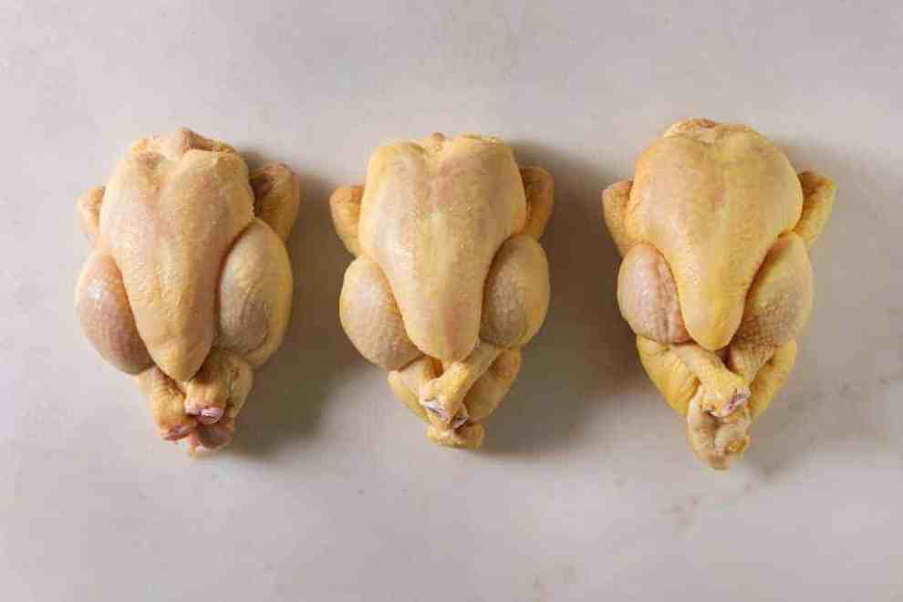 Three raw chickens