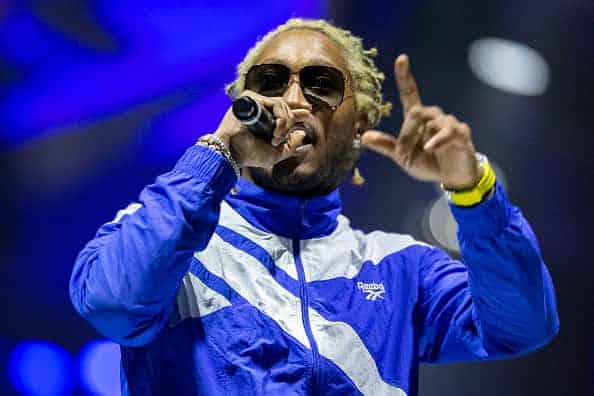 American rapper Future (aka Nayvadius DeMun Wilburn) performs on the runway during the Reebok show on day one of Shanghai Fashio