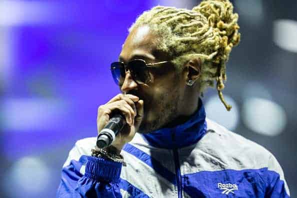 American rapper Future (aka Nayvadius DeMun Wilburn) performs on the runway during the Reebok show on day one of Shanghai Fashio