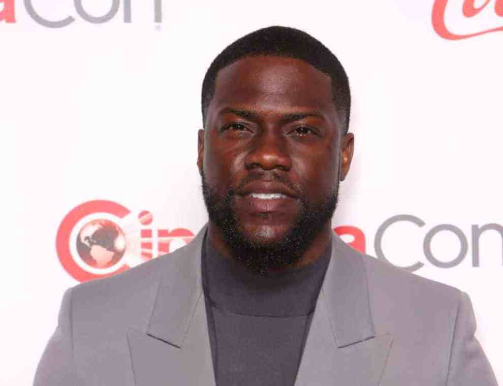 Kevin Hart wearing a grey suit