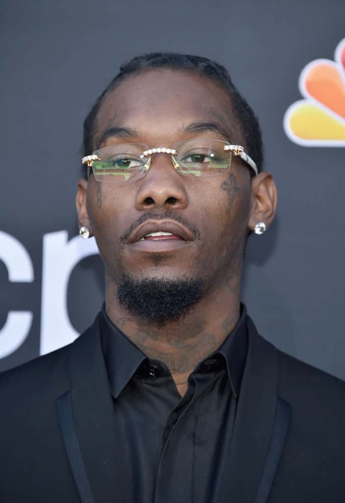 Offset wearing all black tux