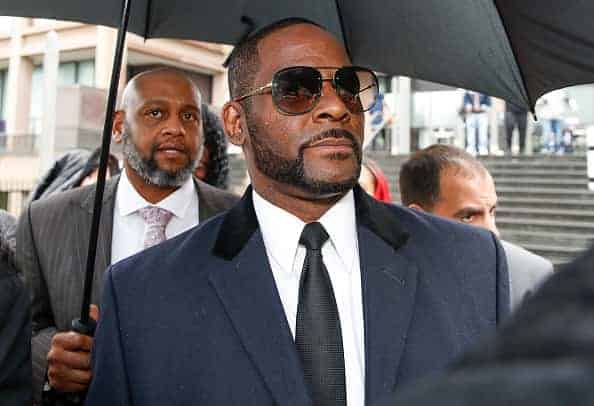 R. Kelly leaves the Leighton Criminal Court Building after a hearing on sexual abuse charges on May 7