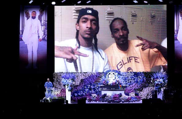 Snoop Dogg speaks onstage during Nipsey Hussle's Celebration of Life at STAPLES Center on April 11