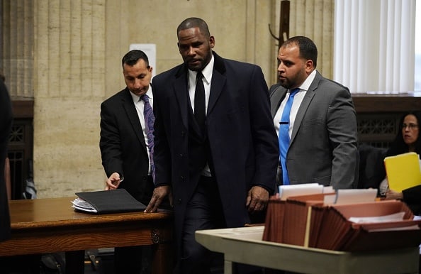 R. Kelly (C) appears at a hearing before Judge Lawrence Flood at Leighton Criminal Court Building in Chicago on May 7
