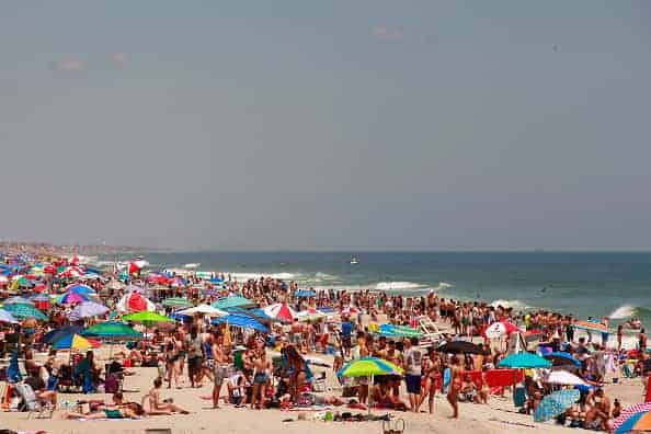 People visit the beach during Memorial Day weekend on May 26