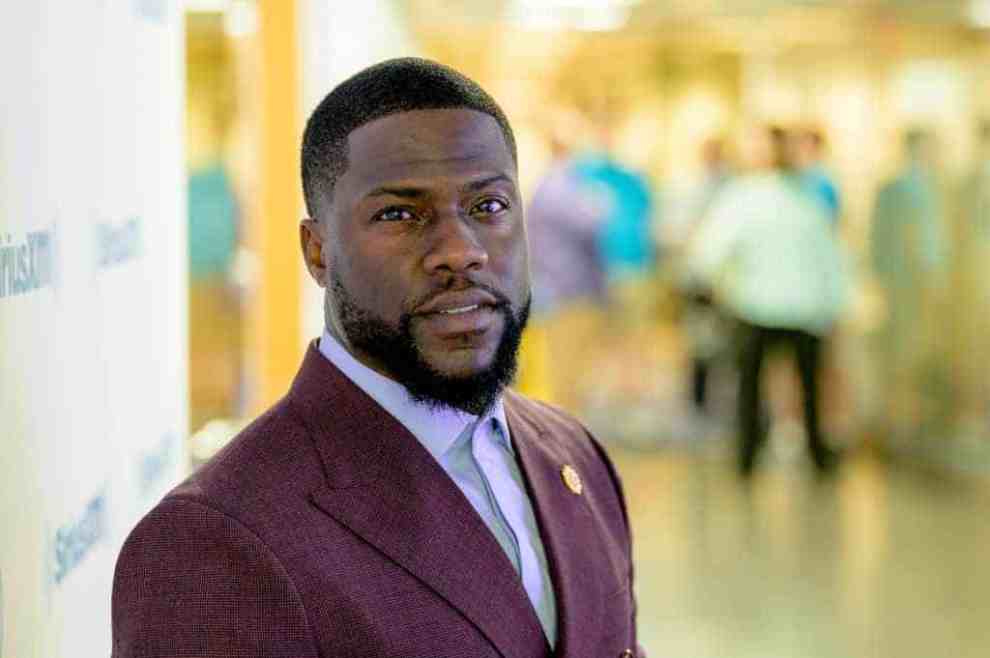 Kevin Hart wearing a burgundy suit