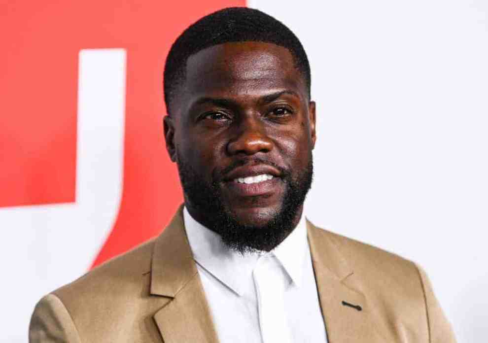 Kevin Hart wearing gold and white