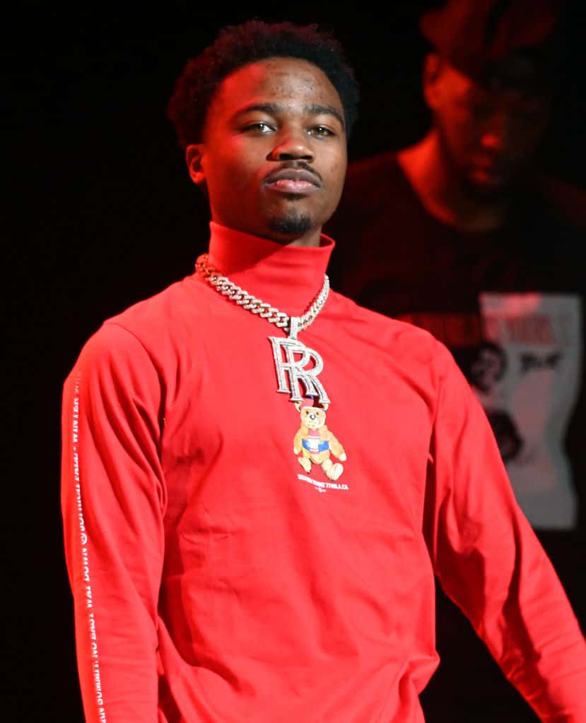 Roddy Ricch wearing a red turtle neck