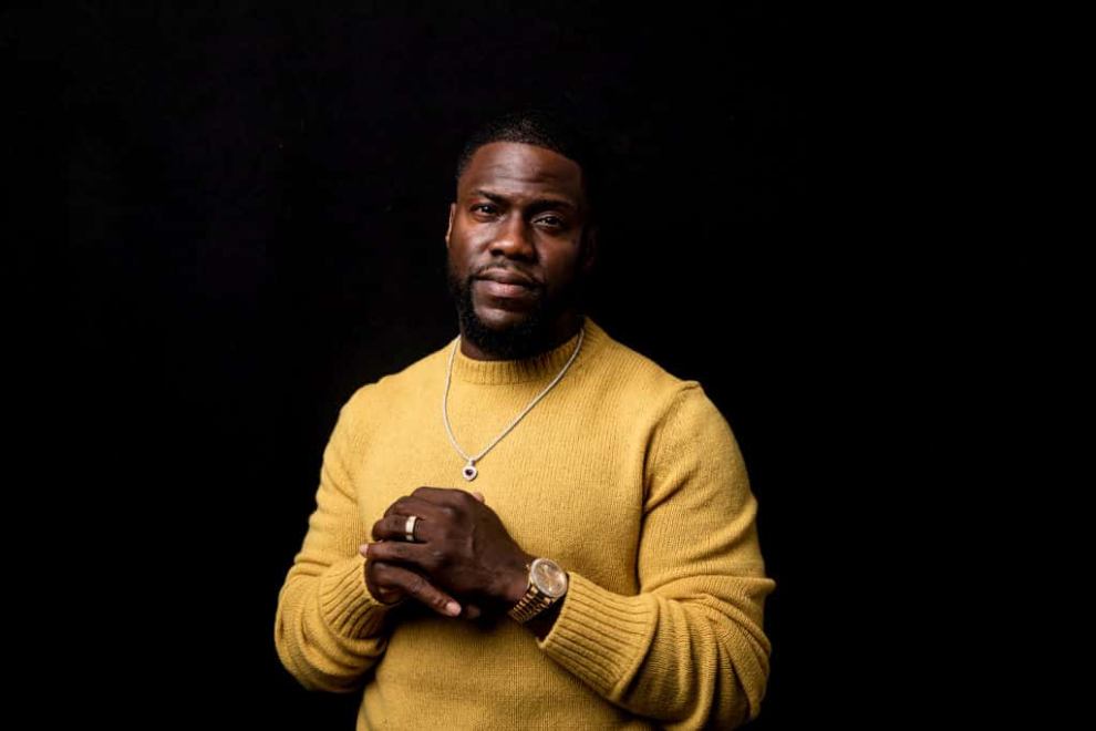 Kevin Hart wearing a yellow sweater