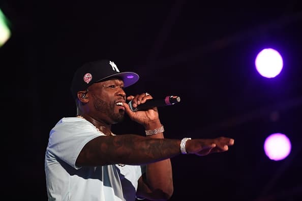 US rapper 50 Cent performs on stage during the Jeddah World music Festival on July 18