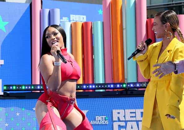 Megan Thee Stallion (L) and Karrueche Tran are seen onstage during the Pre Show at the 2019 BET Awards at Microsoft Theater on J