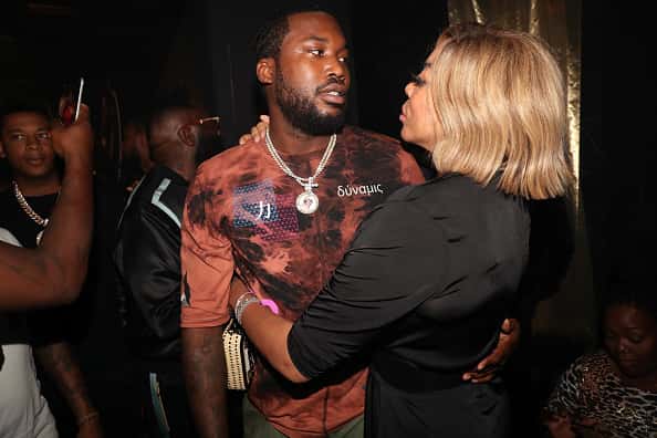 Meek Mill (L) and Wendy Williams attend the Rick Ross "Port Of Miami 2" album release celebration at Villain on August 8
