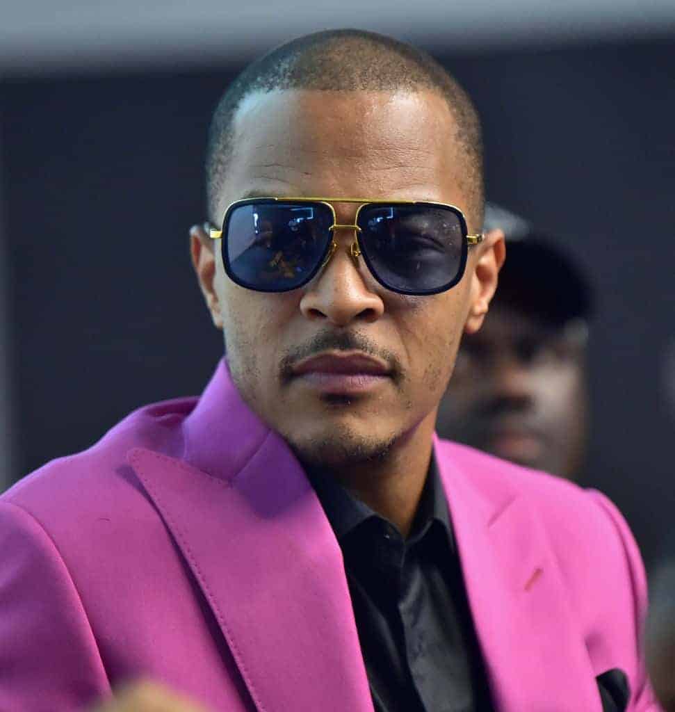 T.I wearing pink and black