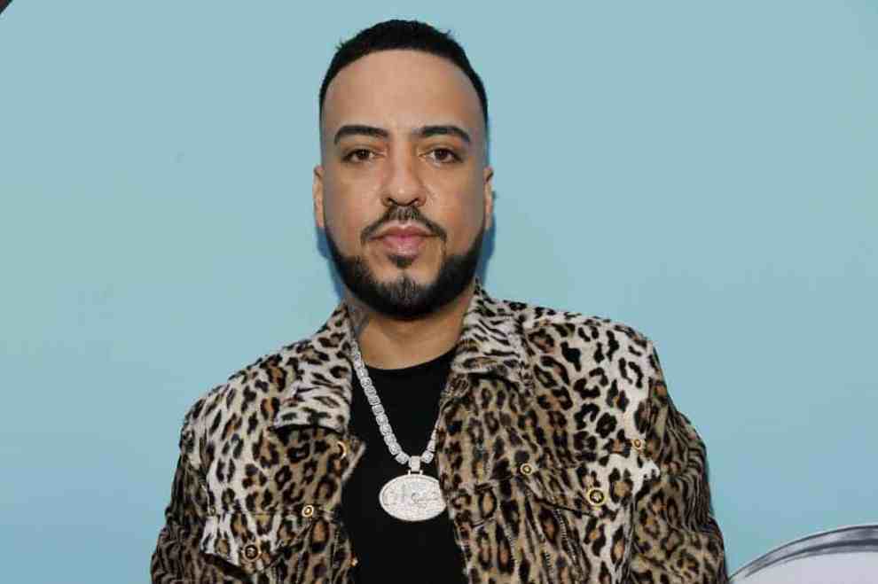 French Montana wearing leopard print jacket