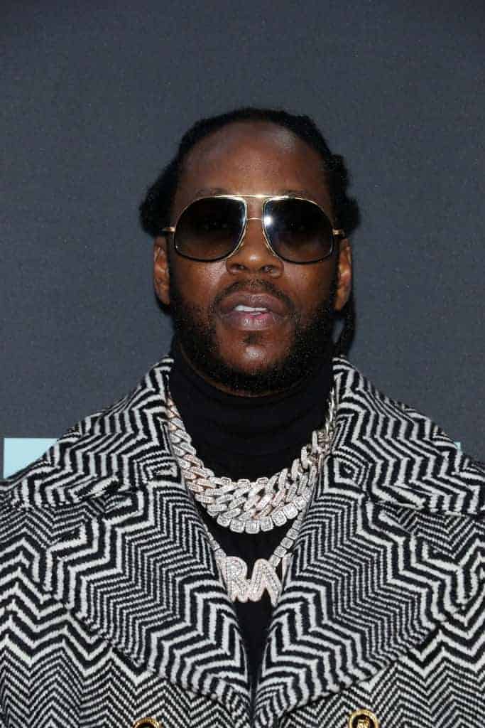 2 Chainz wearing a jacket and shades