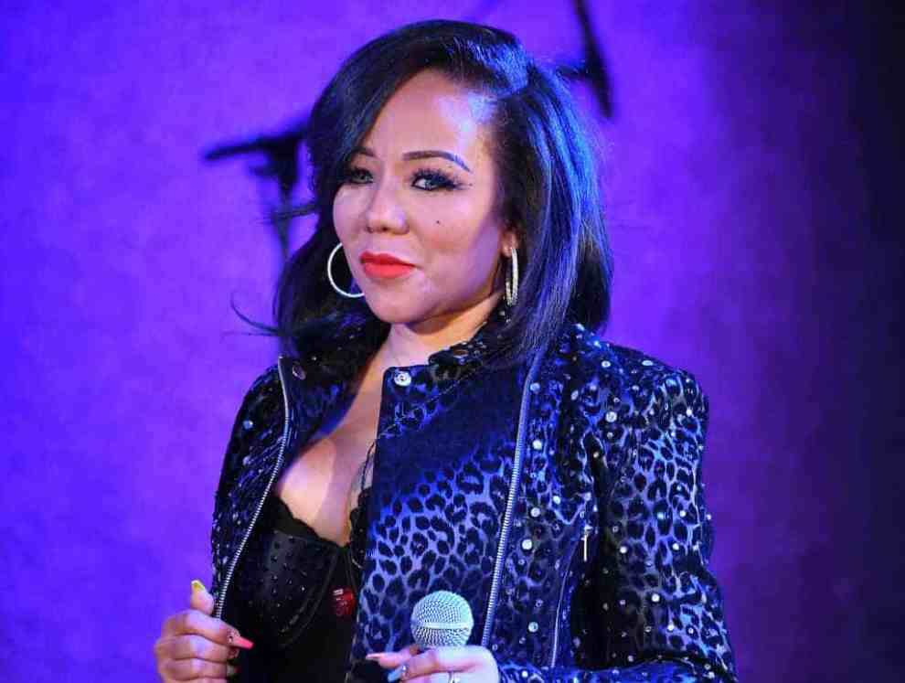 Tiny Harris wearing black