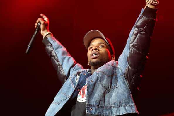 Tory Lanez performs on stage at Prudential Center on September 13