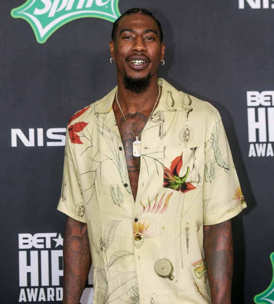 Iman Shumpert wearing a tan shirt