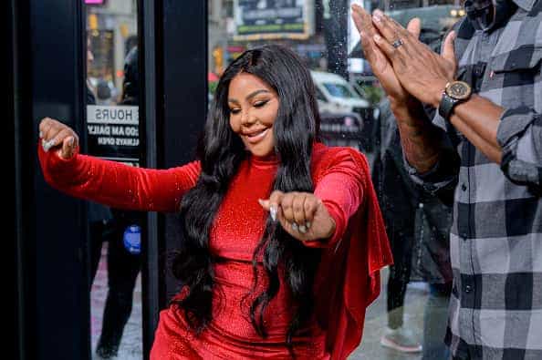Rapper Lil Kim Visits "Extra" at The Levi's Store Times Square on October 09