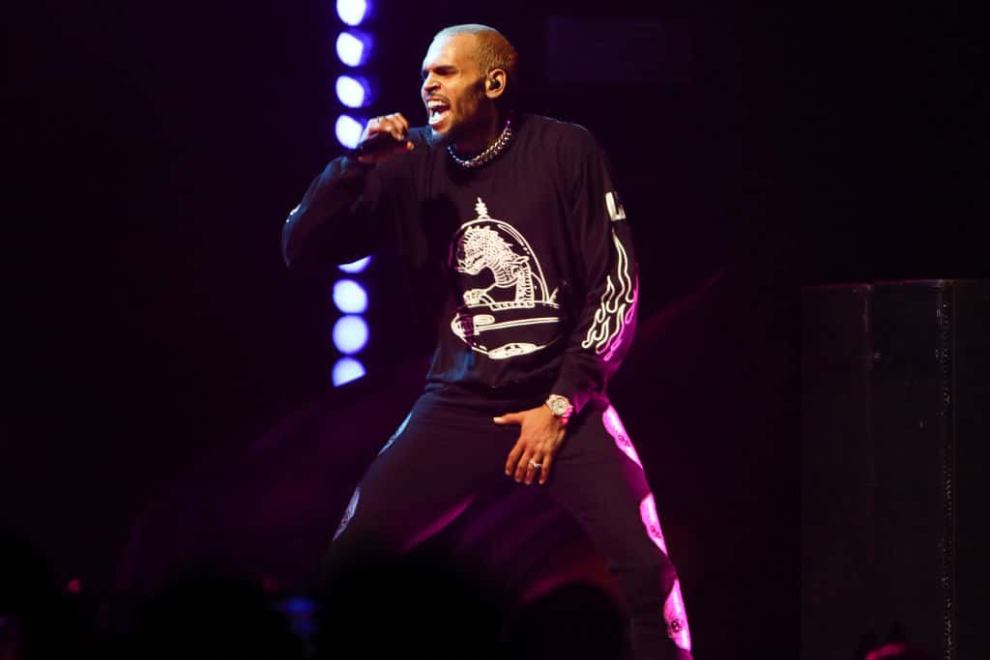 Chris Brown on stage wearing black