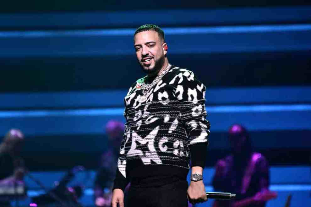French Montana wearing a white and black sweater