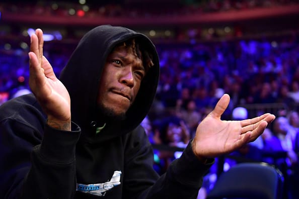 Retired NBA player Nate Robinson cheers during the first half of the New York Knicks and Chicago Bulls game at Madison Square Garden on October 28