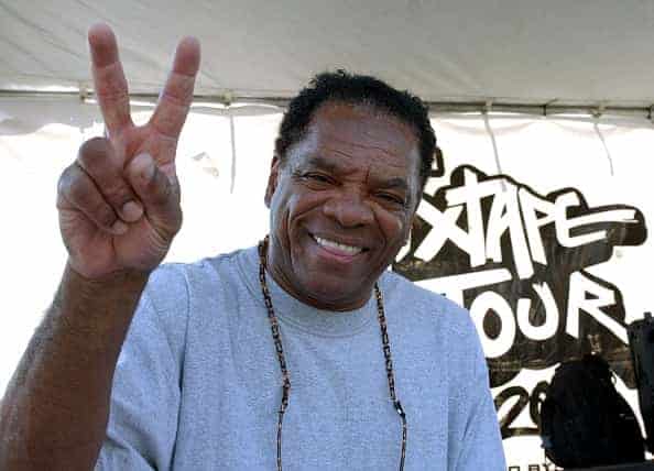 John Witherspoon looks on as Los Angeles Street Ballers compete for the chance to play against the 2004 Team AND1 on the blackto