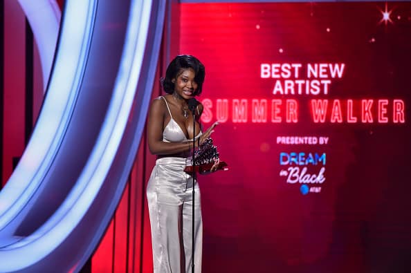 Summer Walker speaks onstage after accepting the Best New Artist award during the Soul Train Music Awards at the Orleans Arena on November 17