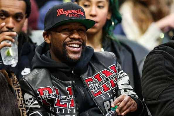 Floyd Mayweather is seen at a game between the Atlanta Hawks and the Milwaukee Bucks at State Farm Arena on December 27
