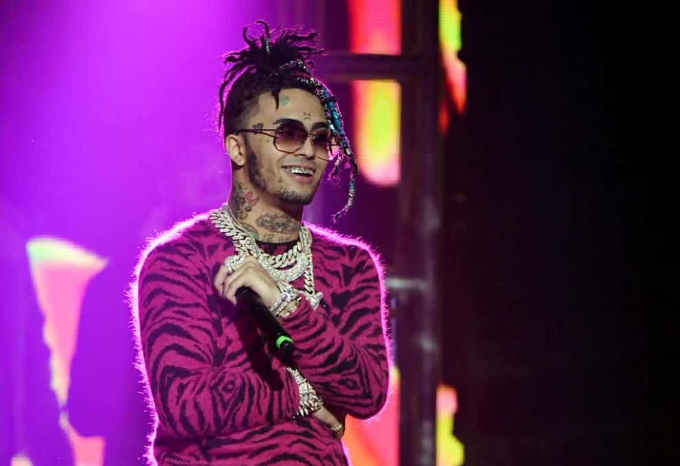 Lil Pump wearing pink and black on stage