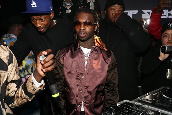 Recording artist Pop Smoke (c) attends the Pop Smoke Listening Party at Villain on February 06