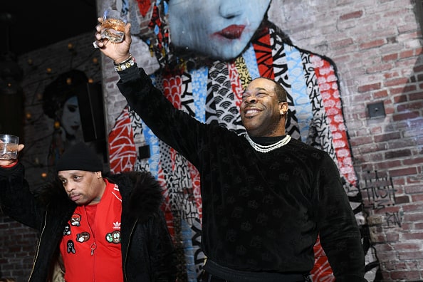 Busta Rhymes performs during the Black on Both Sides 20th Anniversary concert at The Greek Theatre on October 25