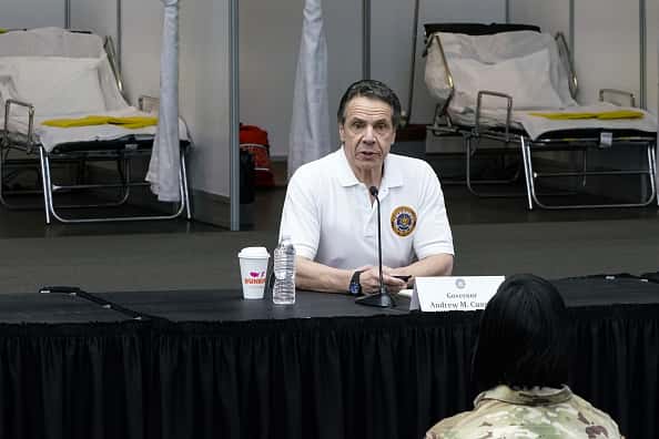 New York Gov Andrew Cuomo gives a daily coronavirus press conference in front of media and National Guard members at the Jacob K. Javits Convention Center