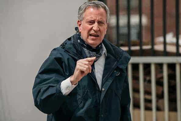New York City Mayor Bill de Blasio speaks at a food shelf organized by The Campaign Against Hunger in Bed Stuy