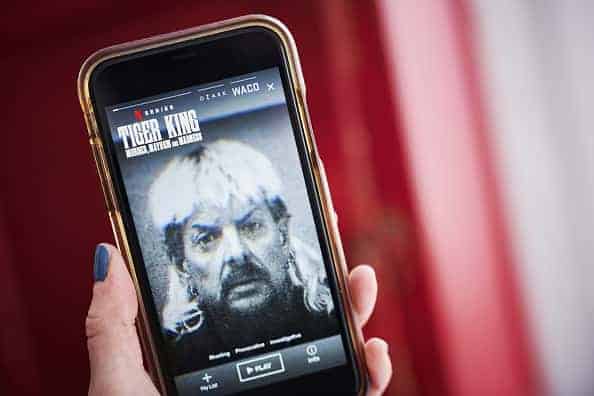 The Netflix Inc. true crime documentary miniseries "Tiger King" trailer is displayed on a smartphone in an arranged photograph taken in the Brooklyn Borough of New York