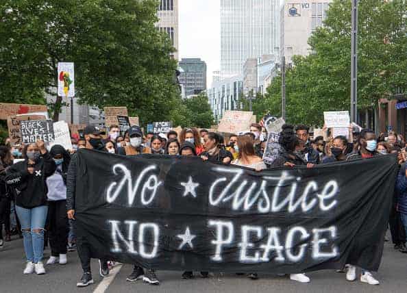 Demonstrators protest the death of George Floyd on June 5